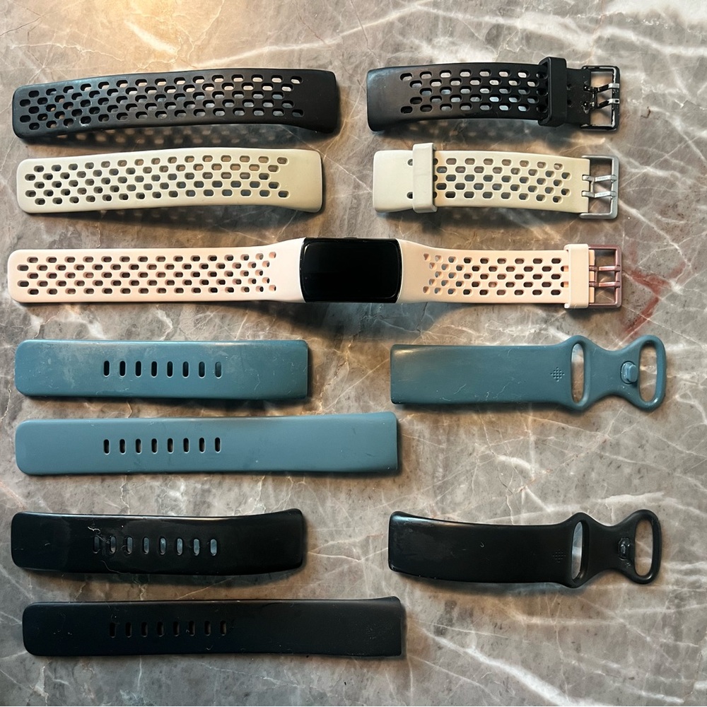 Assorted Woman’s Fitbit Bands in Black, Cream, Pink and Blue